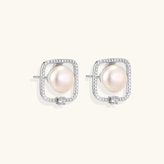 Square sterling silver stud earrings with freshwater pearls and crystal accents on white background.