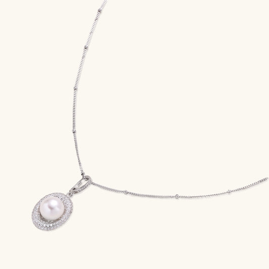 Sterling silver necklace with freshwater pearl in sparkling crystal halo pendant on delicate beaded chain