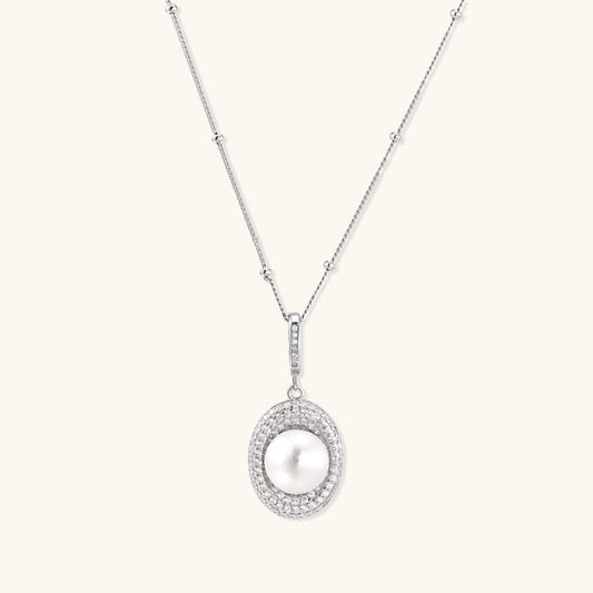 Sterling silver necklace with freshwater pearl in sparkling crystal halo pendant on delicate beaded chain