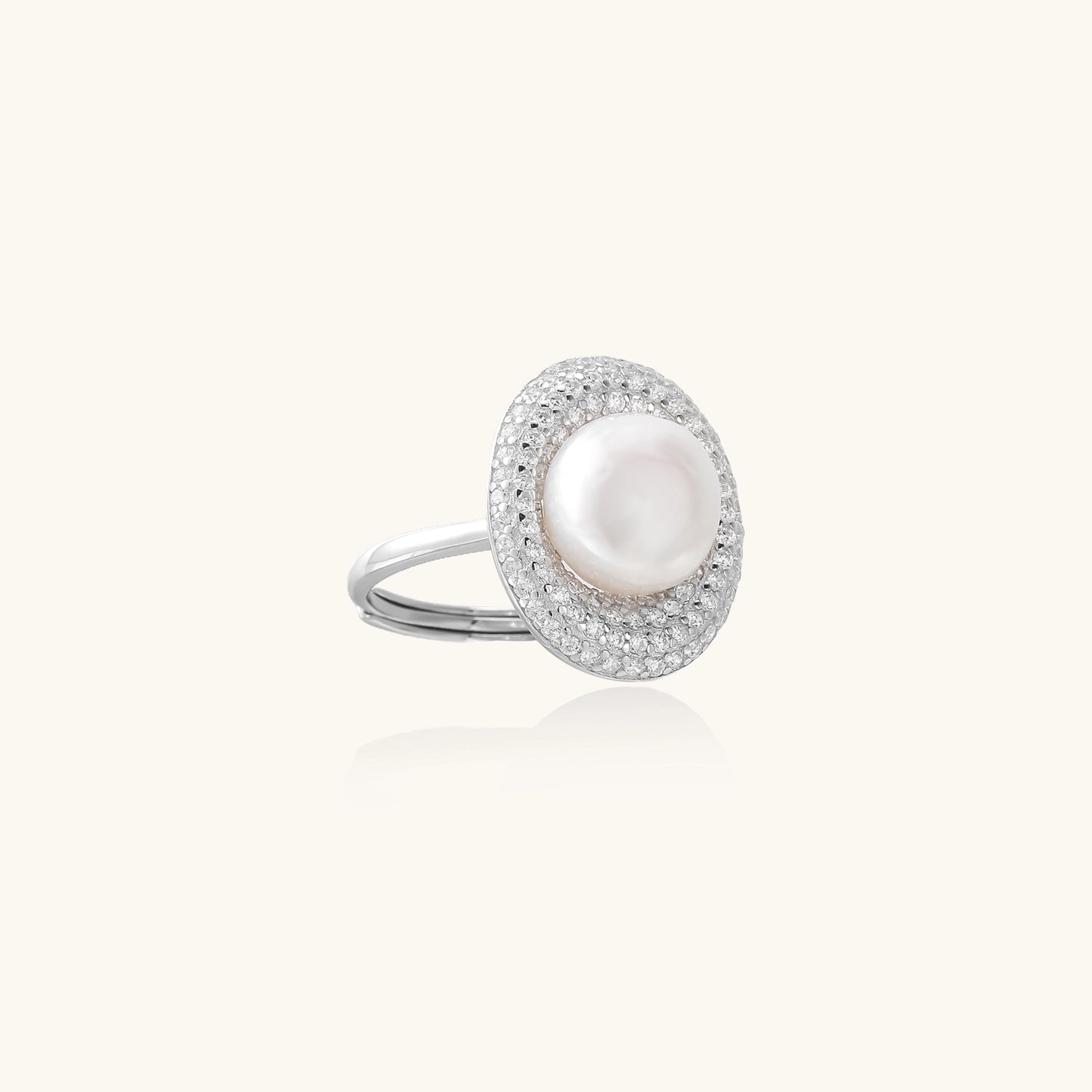 Sterling silver ring with 9mm freshwater pearl center surrounded by double halo of sparkling crystals